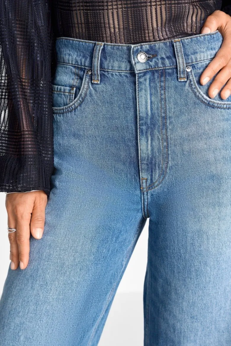Baumwolljeans mit Fransensaum