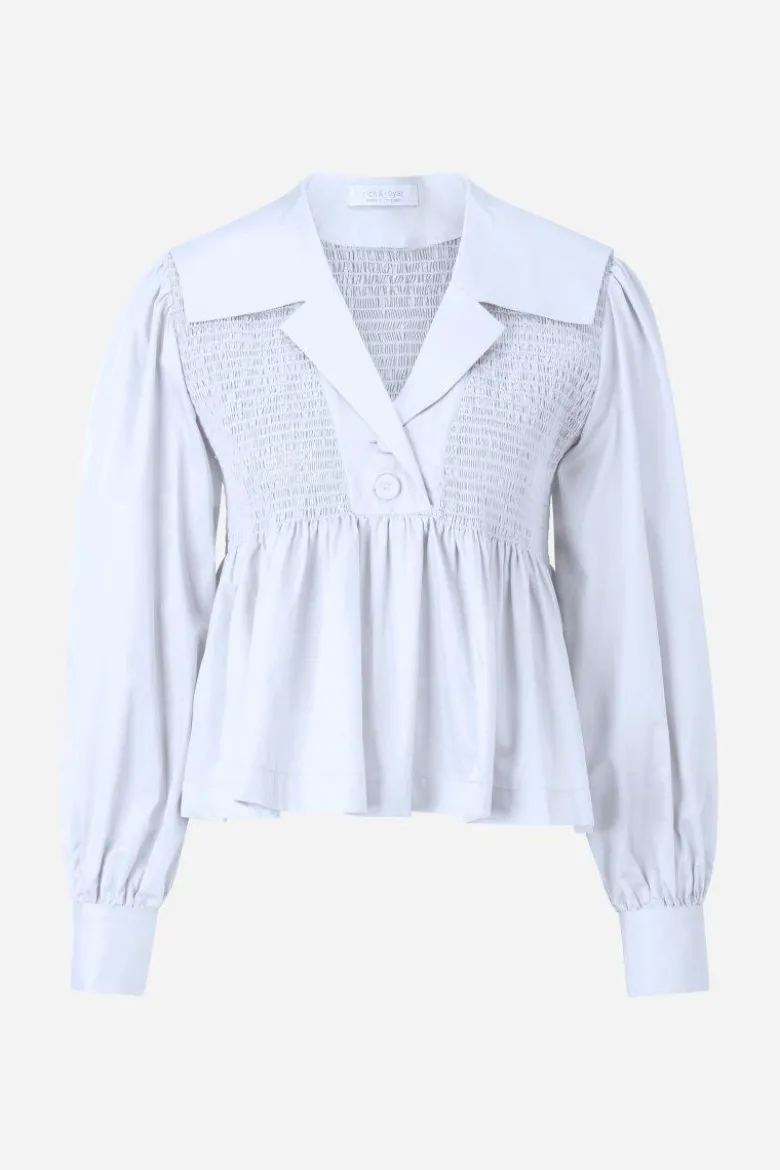 Bluse mit Schößchen