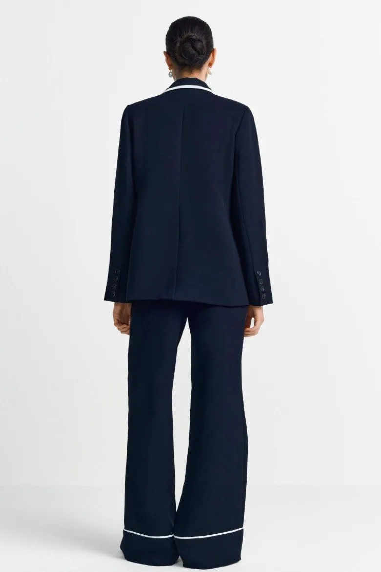 Marineblauer Blazer mit Kontrastpaspel