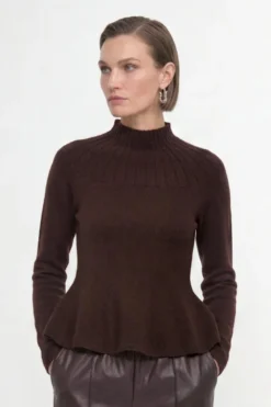 Merinopullover mit Peplum-Saum